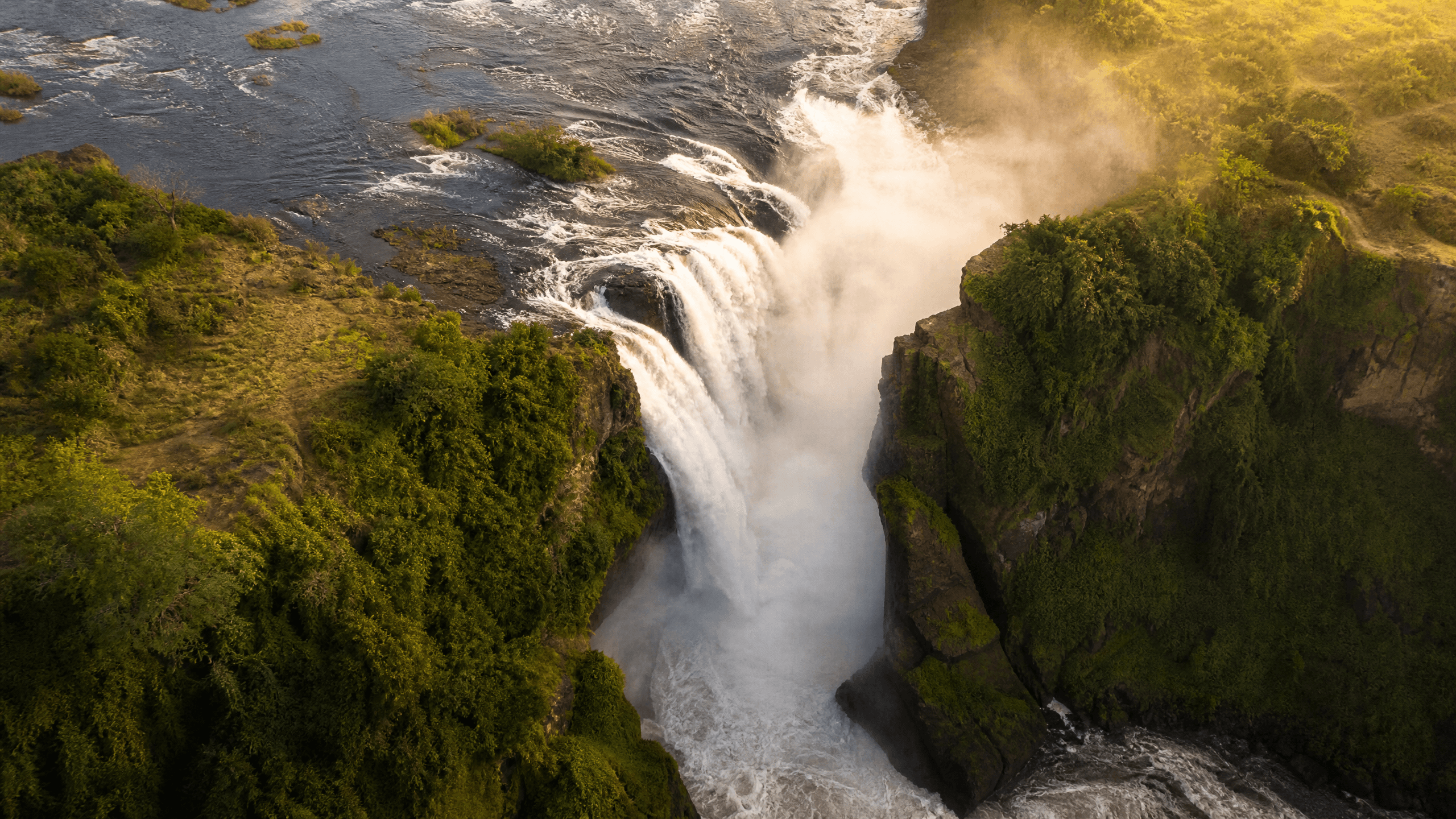 Aerial view of Murchison Falls on the Victoria Nile, Uganda — the Nile forced through a seven-metre gap and dropping forty-three metres into the gorge below